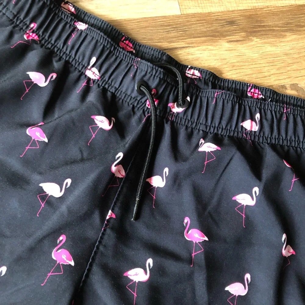 Men’s Black w/ pink Flamingos swim trunks  Hollister  Size Medium